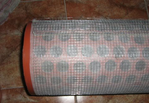 Труба в сетке